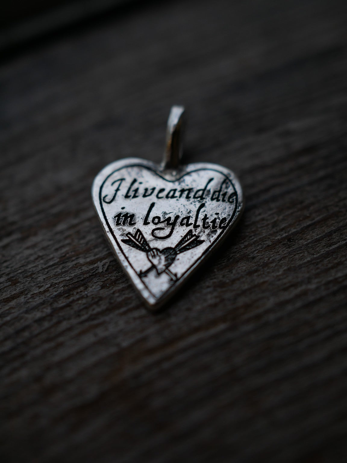 Hand engraved silver heart pendant